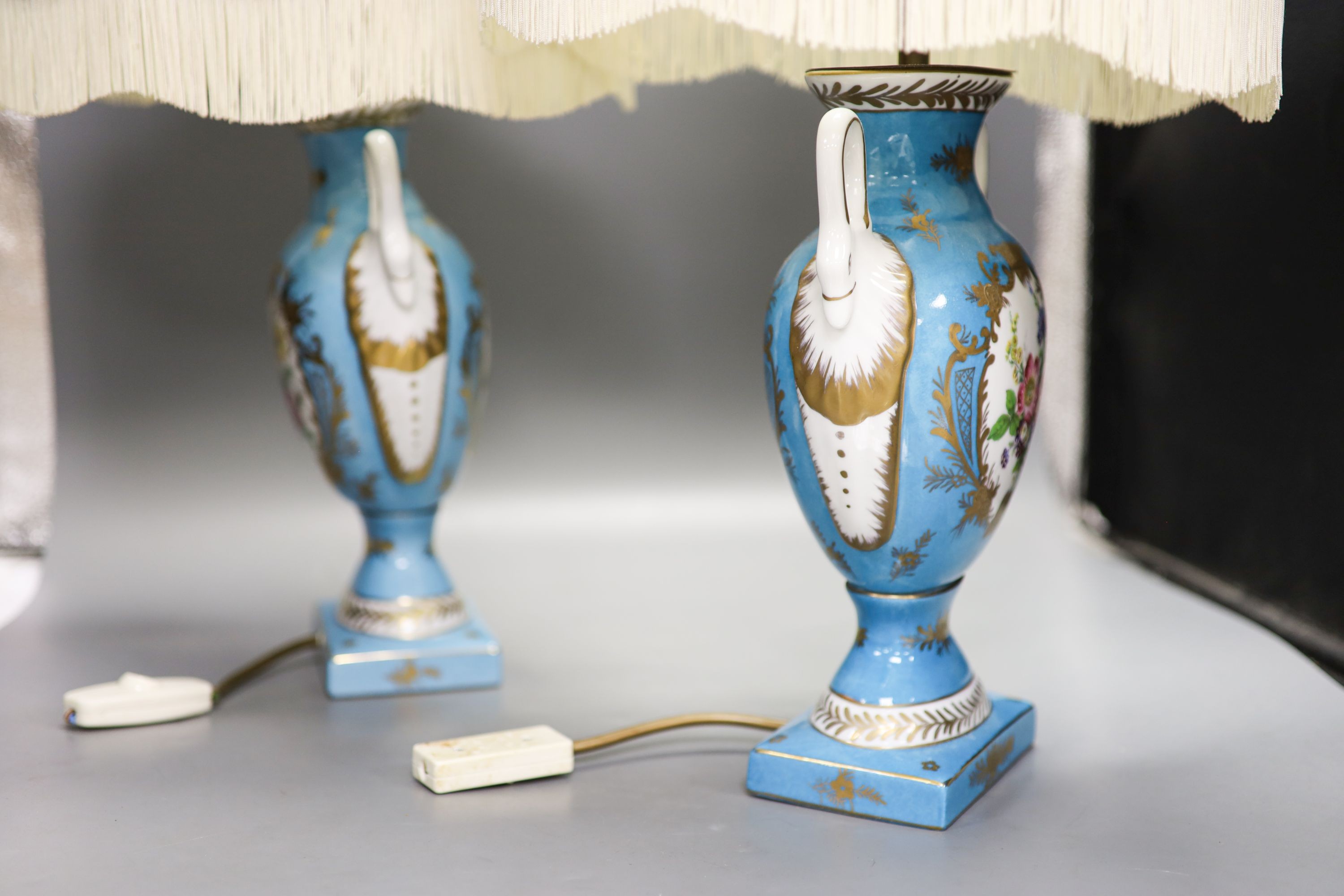 A pair of Sevres style porcelain table lamps with shades 56cm total height incl shades